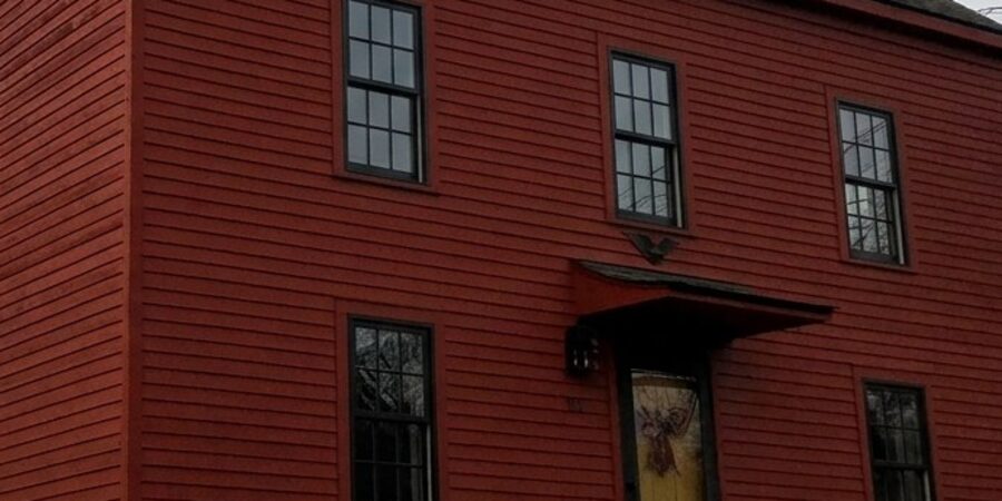 Same house with new black-frame windows (AI preview)